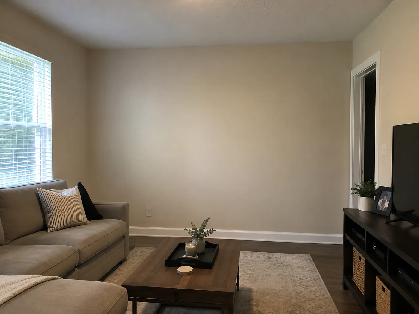 Cozy living room with freshly painted beige walls